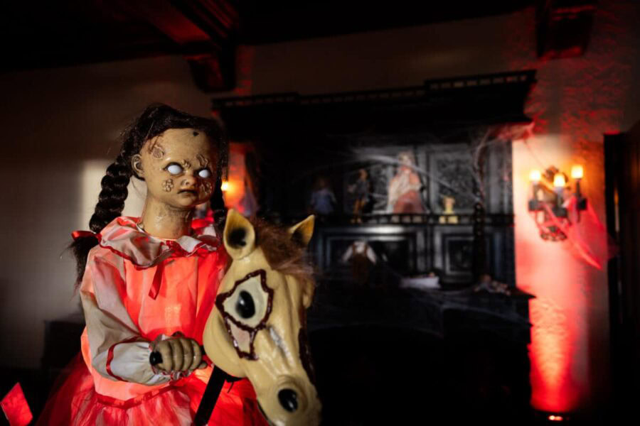 Spooky doll halloween decor