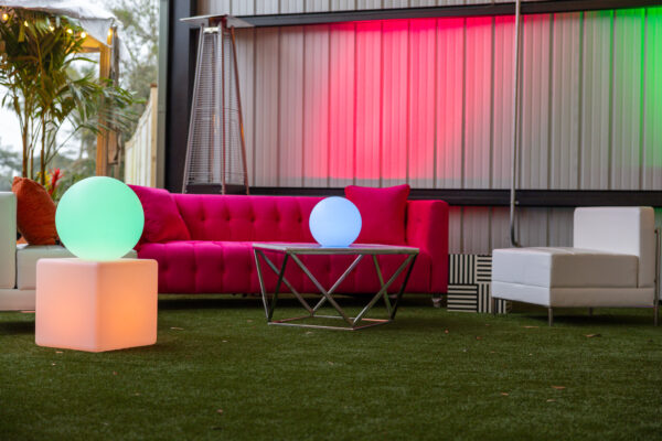 Pink_Sofa_White_Leather_Chair_Modern_Event_Furniture_Rentals_Jacksonville