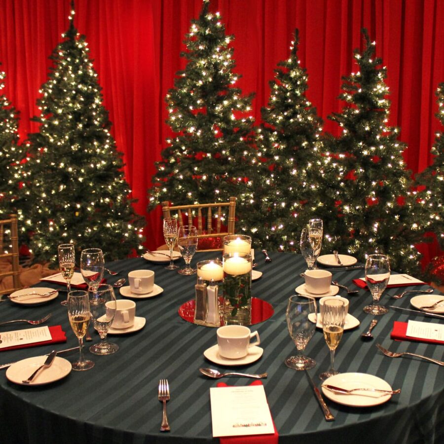 Christmas party decoration with christmas tree and holiday table decor