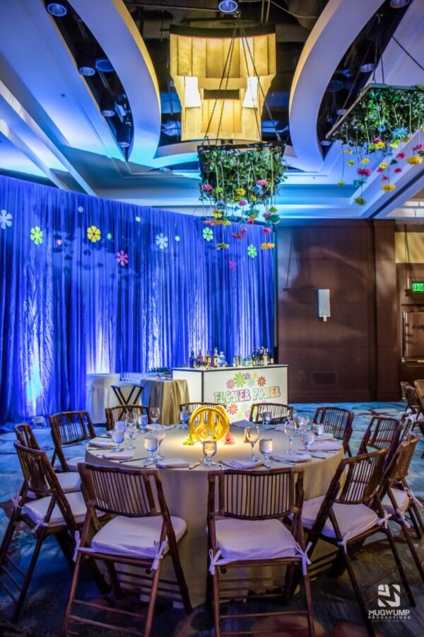 Event-Uplighting-Blue-Backdrop-Bright-Florals