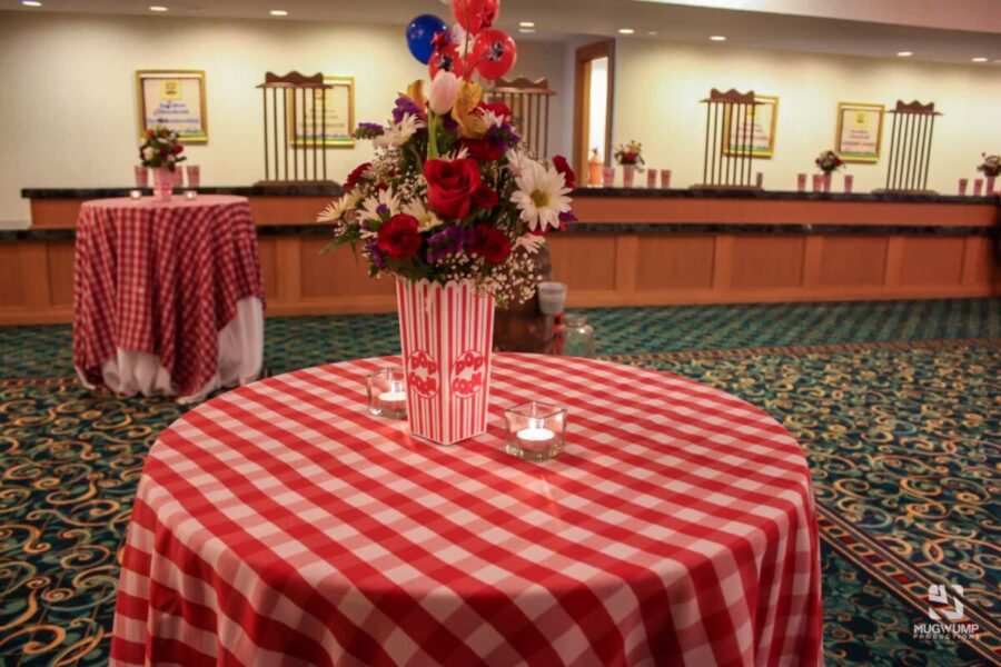 Red-Gingham-Table-Linen-With-Floral-Arrangement