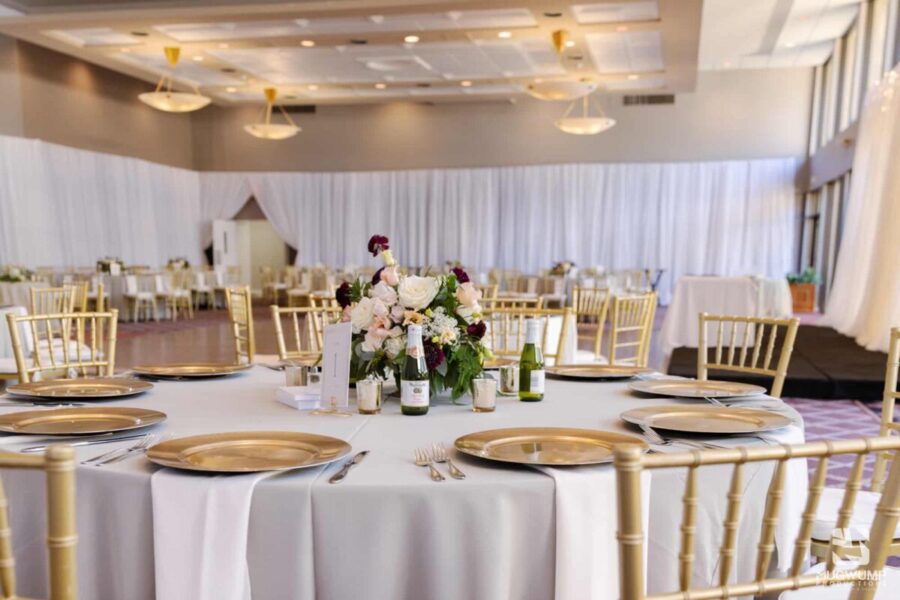 Wedding-Decor-Gold-Chargers-With-White-Linens