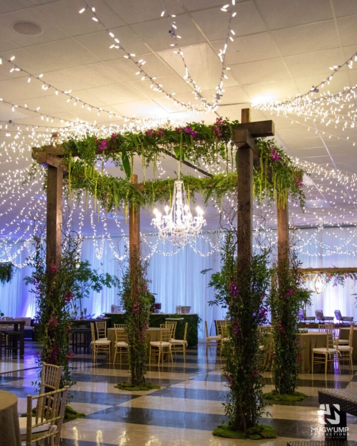 Wooden-Pergola-With-Florals-And-Greenery